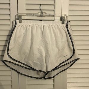 Women’s white and black nike running shorts.